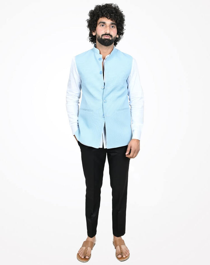Model wearing Sky Blue Self Mens Nehru Jacket on white shirt and black trouser | Amogue