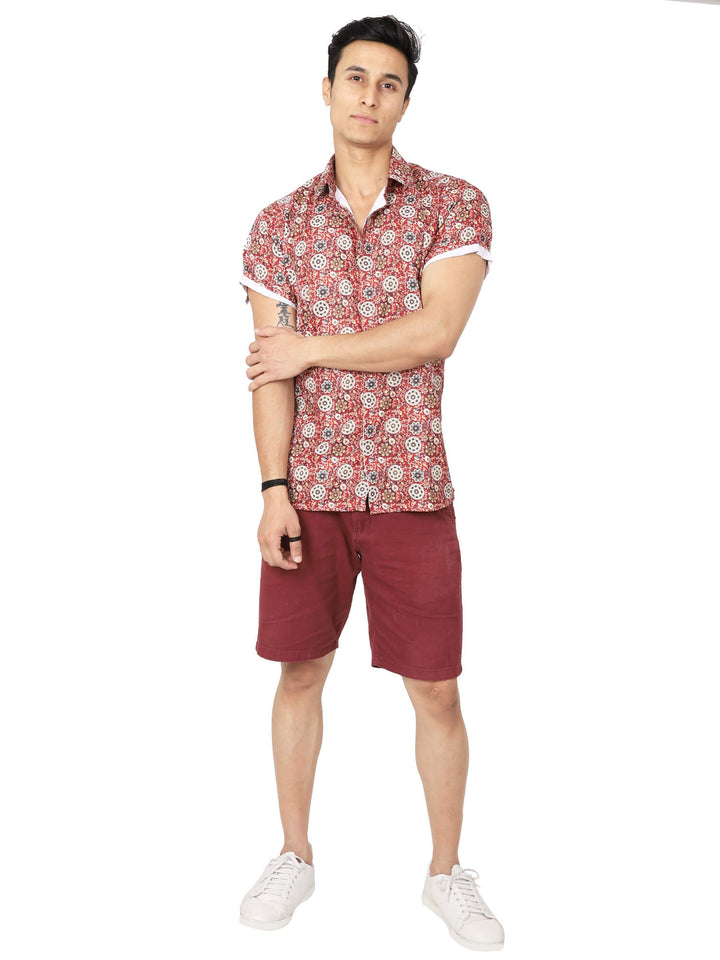 Model wearing half-sleeves digital printed red casual shirt and red shorts