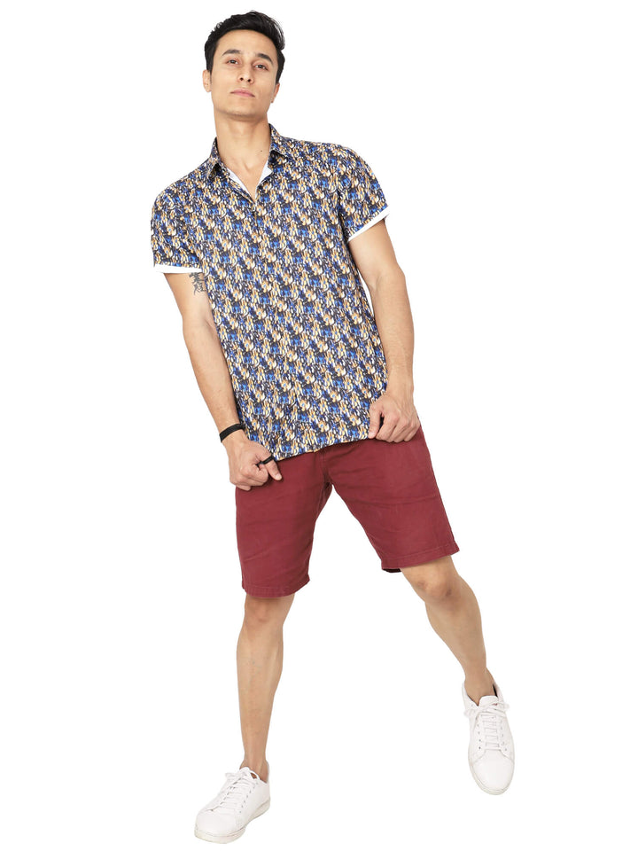 Model wearing Digital Printed Multicolor Mens Casual Shirt on red short and white sneakers