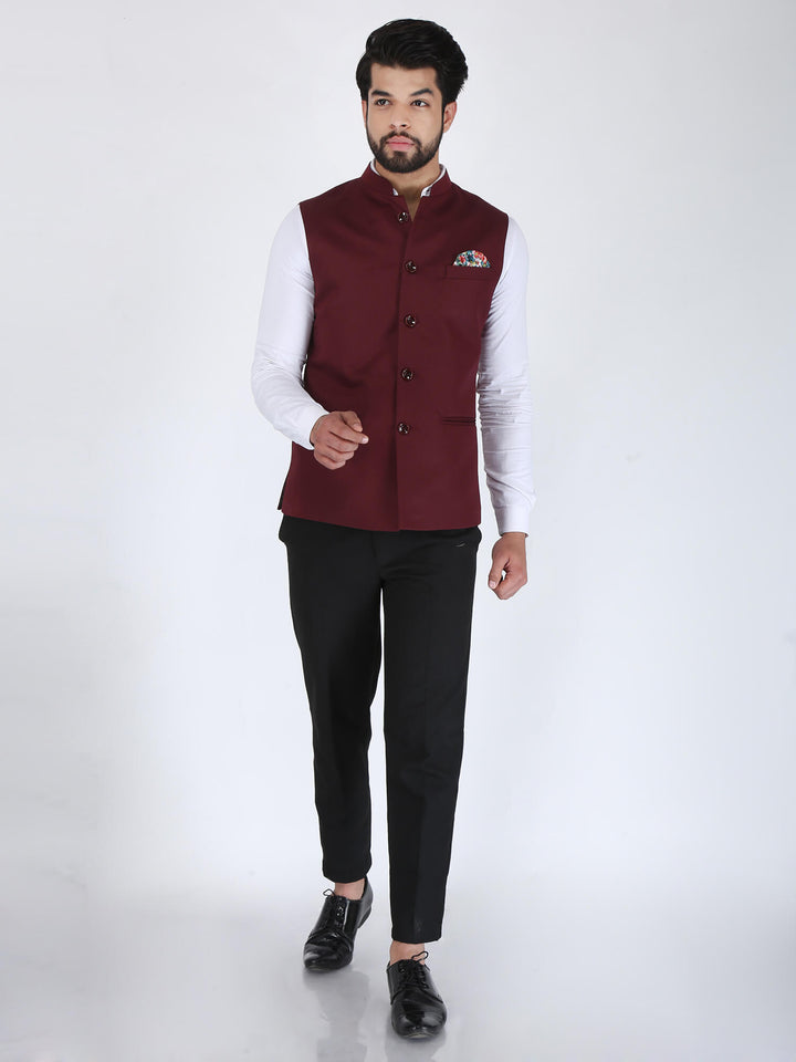 Model wearing Maroon Wine Solid Formal Nehru Jacket on white shirt and black trouser.