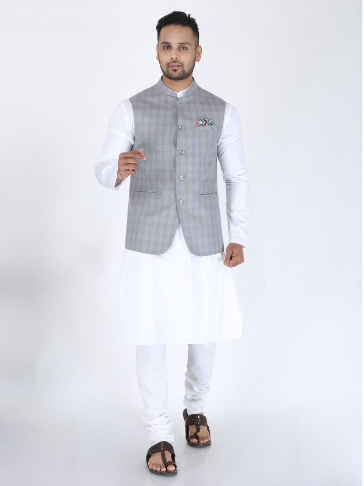 Model wearing Grey Checks Classic Nehru Jacket on white kurta pyjama