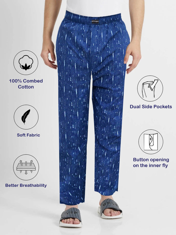 Details of Man wearing Navy Blue Printed Regular Fit Pyjamas with casual flip flops